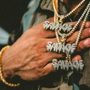 SAVAGE CZ CHARM GOLD PLATED!